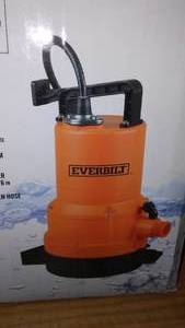 lot 214 image: Everbilt One Quarter Horse Pump in Box.