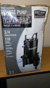 lot 215 image: Everbilt Sewage Pump, In box.