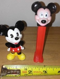 lot 235 image: Disney Mickey Mouse Pez and porcelain figure.