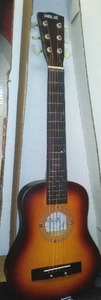 lot 256 image: Guitar, childrens and small hand sized. new condition