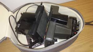 lot 259 image: Polaroid cameras (2) and case.