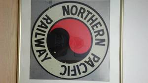 lot 283 image: Northern Pacific railway sign- framed, very cool.