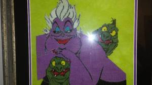 lot 903 image: Framed needlework of Ursula.