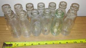 lot 922 image: (13) Edison Battery Oil Bottles.