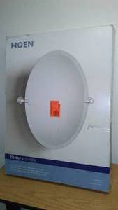 lot 1012 image: Moen Oval Mirror- New in Box.