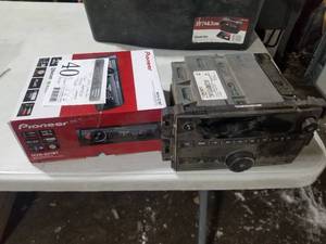 lot 40 image: Lot of (2) Automobile Stereos  - Pioneer Digital Media Receiver MVH-S21BT, 2016 Chevrolet Express Cube Van Stereo