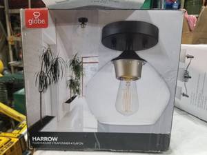 lot 71 image: Globe Harrow Matte BlackGold Accent Flush Mount Light Fixture with Clear Glass Shade (in original box)