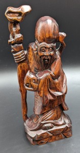 lot 32 image: Asian Carved Wood Figurines