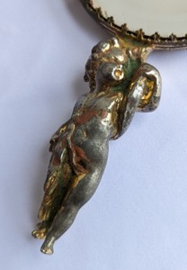 lot 47 image: Antique Cherub Hand Mirror