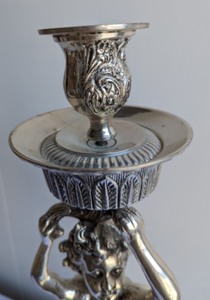 lot 60 image: Ornate Figural Candleholder