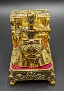 lot 253 image: Brass Woman Playing Piano Music Box- Music Box Dancer