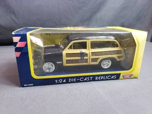 lot 83 image: 1949 Ford Woody Wagon 124 by Motor Max