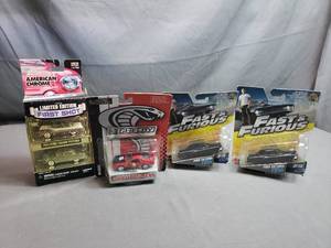 lot 102 image: 4 Small Diecast Cars