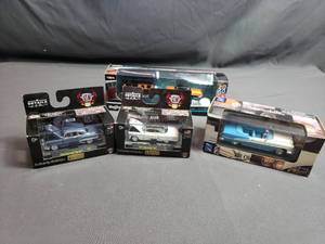 lot 104 image: Lot of 4 Die Cast Cars