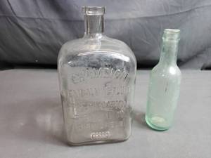 lot 112 image: Vintage Champion 56 Oz Poison Embalming Fluid Bottle