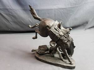 lot 127 image: The Wicked Pony Brass Repro Frederic Remington No. 0145 of 9500