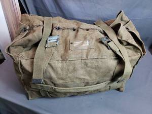 lot 151 image: Canvas Military Duffle with Chain and Loop Closure