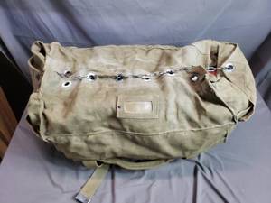 lot 153 image: Canvas Military Duffle with Chain and Loop Closure