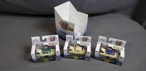 lot 93 image: 3 M2 Machines 164 Die Cast Cars
