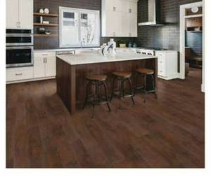 lot 321 image: Roughly 425 Sq Ft (25 Boxes) of Mohawk Rustic Spiced Oak Laminate Flooring