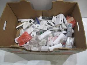 lot 376 image: Apple Crate of Remote Controls for Air Conditioners and other Electronics