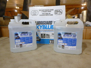 lot 55 image: 2 Jugs of Warren Lubriguard Sky Blue DEF Diesel Exhaust Fluid