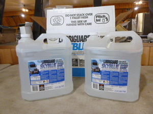lot 56 image: 2 Jugs of Warren Lubriguard Sky Blue DEF Diesel Exhaust Fluid