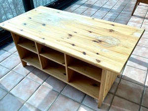 Light Wood Colored Coffee Table with Storage Slots