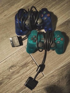 lot 17 image: Two PlayStation2 Remotes