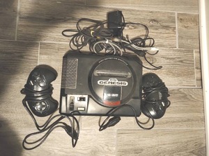 lot 150 image: Sega Genesis with Two Remotes