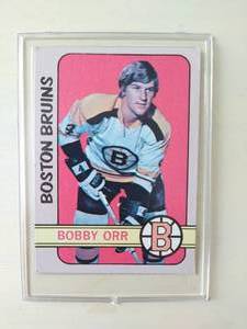 lot 103 image: 1973 TOPPS Bruins Bobby Orr Hockey Trading Card #100