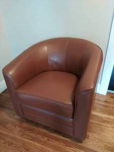 lot 61 image: Faux Leather Rotating Arm Chair