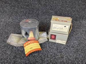 lot 29 image: Lot of (3) Suzuki Pistons (Right) Part No. 12110-31001 for 1972-77 GT750 Water Buffalo, Part No. 12110-03700-050 for 1966-1968 Suzuki K11, and Part No. 12110-09715 for 1968 Suzuki 150 S32-2 NOS