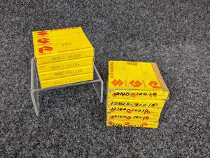 lot 39 image: Lot of (9) Suzuki Piston Rings - Part Nos. 12140-10010 and 00031-010135 NOS