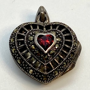 lot 17 image: Sterling Heart Shaped Marcasite Locket Pendant