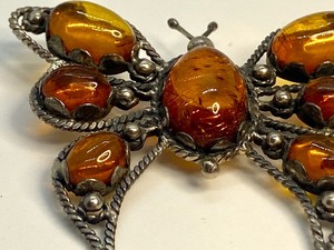 lot 42 image: Lovely Sterling and Amber Butterfly Brooch