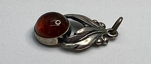 lot 76 image: Petite Neils Erik Sterling and Amber Pendant