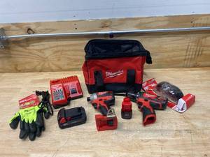 lot 13 image: MILWAUKEE M18- 14 Impact Driver, M12- 38 DrillDriver with Charger, 2 Batteries, Gloves, Safety Glasses and Tool Bag