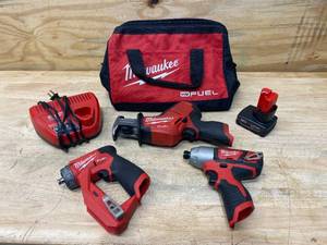 lot 104 image: MILWAUKEE M12 38 Drill Driver, Hackzall, 14 Hex Impact Driver, Charger, 6Ah Battery with Tool Bag