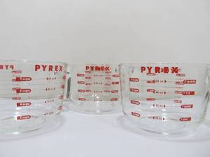 lot 54 image: 3 Larger Sized Unused PYREX Glass Measuring Pitchers