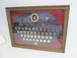 lot 35 image: Framed US Presidential Dollar Collection Coin Set