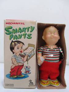 lot 136 image: Vintage Smarty Pants Wind-Up Toy wBox
