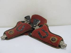lot 139 image: Pair of Vintage NICHOLS Stallion 38 Western Cowboy Cap Pistols with Holsters