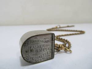 lot 280 image: Antique Victorian H.B. Hardenburg & Company Advertising Coin Holder wChain