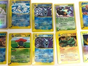 lot 7 image: Lot of Assorted Older Hologram POKEMON Cards