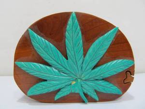 lot 301 image: Carved Vintage Wooden Marijuana Leaf Puzzle Box