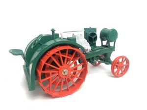 lot 60 image: ERTL Diecast Metal Farm Toy The Overtime Tractor