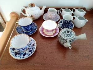 lot 62 image: Collection of Tea Cups, Teapot, and Creamers