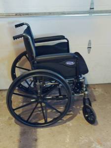 lot 561 image: Invacare Wheel Chair
