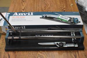 Anvil tile cutter